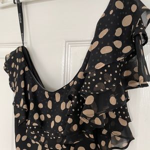 Bebe one shoulder top. Black with beige do…